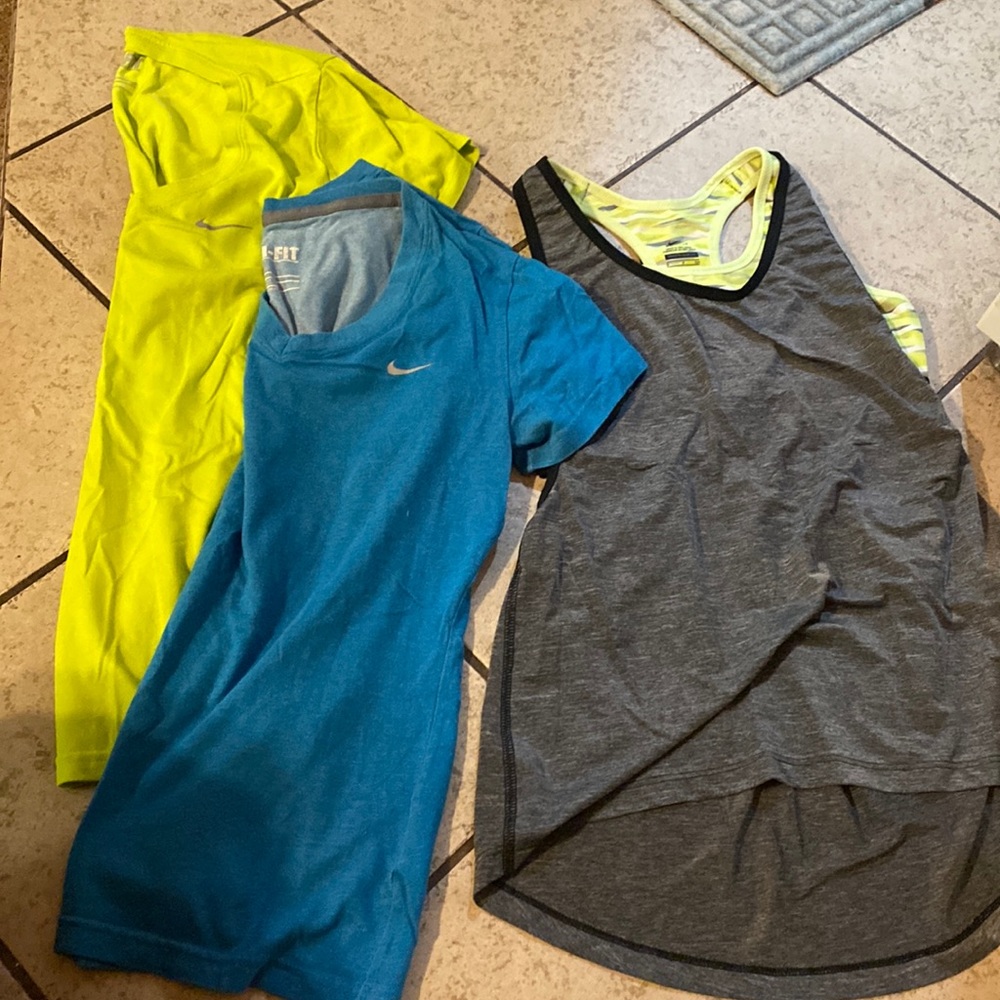Three Nike tops